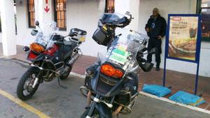 Our own car guard, complete with hand on his pistol looked after the bikes.: Start point as the Sawrtland Engen n the N7, 20 kilos West of the N1, Cape Town