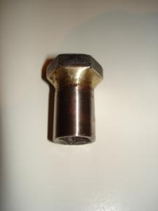 Front wheel spindle removal tool: 22mm bolt machined and shortened to fit into a 1/4" socket and braised.