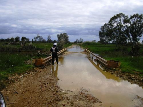 Annie recons the water traps -this is the Berg overflowing into the farm roads