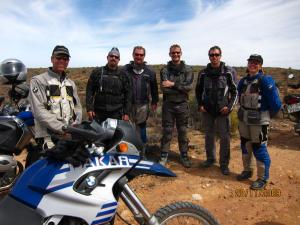 Leon, Hein, Geoff, Ludwig, Tristan, Liza posing behind Ludwig's Dakar which they managed to piece back together and make it rideable again.