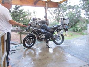 spray down the bike to rid it of surface dust