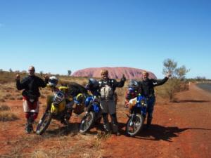 The three of us in front of Ularu, the holy and meeting place of the Aboriginal people.
