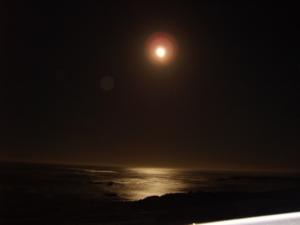 The moon setting over the West Coast